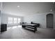 Large game room with a pool table, additional seating, and multiple windows for natural light at 7536 Green Mountain Way, Winter Garden, FL 34787