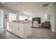 Bright kitchen with granite countertops and stainless appliances and open layout at 7536 Green Mountain Way, Winter Garden, FL 34787