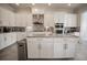 Kitchen featuring granite countertops, stainless steel appliances, and a tile backsplash at 7536 Green Mountain Way, Winter Garden, FL 34787