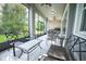 Covered patio features ceiling fans and views of the backyard at 7536 Green Mountain Way, Winter Garden, FL 34787