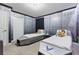 Themed bedroom with two twin beds, 'Air Force' bedframes and movie characters at 8833 Cruden Bay Ct, Davenport, FL 33896
