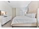 Bright bedroom with stylish decor, plush carpeting, and ample closet space at 8833 Cruden Bay Ct, Davenport, FL 33896