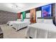 Themed bedroom with three beds, super hero wall decor and grey carpet at 8833 Cruden Bay Ct, Davenport, FL 33896