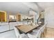 Elegant dining area showcases modern lighting and an open floor plan at 8833 Cruden Bay Ct, Davenport, FL 33896