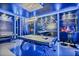 Spacious game room features two pool tables and Star Wars-themed decor and lighting at 8833 Cruden Bay Ct, Davenport, FL 33896