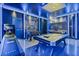 Game room with a pool table, foosball table, arcade game, and Star Wars themed decor at 8833 Cruden Bay Ct, Davenport, FL 33896
