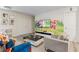 A charming living room with Paw Patrol themed decorations, toys, and comfortable seating at 8833 Cruden Bay Ct, Davenport, FL 33896