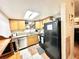 Functional kitchen with tile floors, skylight, ample storage space, and modern appliances at 912 Lake Destiny Rd # F, Altamonte Springs, FL 32714