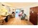 Spacious living room features wood floors and access to the balcony at 912 Lake Destiny Rd # F, Altamonte Springs, FL 32714