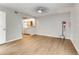 Comfortable bedroom with sleek laminate floors and a light gray accent wall at 950 Vanessa Ct # F, Port Orange, FL 32127