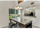 Dining room with an eat-in kitchen and a window view at 950 Vanessa Ct # F, Port Orange, FL 32127