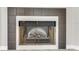 Modern fireplace with dark gray tile surround, adding style to the living space at 950 Vanessa Ct # F, Port Orange, FL 32127