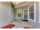 Inviting front porch perfect for greeting guests to the front door at 950 Vanessa Ct # F, Port Orange, FL 32127