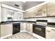 Functional kitchen with a pass-through window and appliances at 950 Vanessa Ct # F, Port Orange, FL 32127