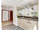 Serving area featuring a sink, cabinets, and a mirror at 950 Vanessa Ct # F, Port Orange, FL 32127
