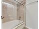 Modern shower with tiled walls, glass doors, and rainfall shower head at 950 Vanessa Ct # F, Port Orange, FL 32127