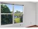 A view of the nearby lake and green space from the window at 950 Vanessa Ct # F, Port Orange, FL 32127