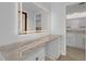 Bathroom with large vanity and mirror, with plenty of storage space at 103 Longhorn Rd, Winter Park, FL 32792