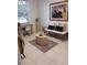 Bright office with desk, daybed, decorative decor and tile floors at 10642 Cloudview Dr, Orlando, FL 32825