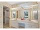 Spacious bathroom with double sinks, vanity, and a large mirror at 112 Brandywine Ln, Longwood, FL 32779