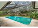 Beautiful in-ground swimming pool inside of a screened enclosure at 112 Brandywine Ln, Longwood, FL 32779