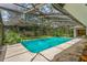 Beautiful in-ground swimming pool inside of a screened enclosure at 112 Brandywine Ln, Longwood, FL 32779