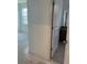 Bathroom with tiled floors, granite countertops, and natural light at 14741 Milfoil Ave, Orlando, FL 32827