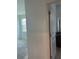 Bathroom with tiled floors, granite countertops, and natural light at 14741 Milfoil Ave, Orlando, FL 32827