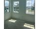 This bedroom has bright, natural light coming in from three windows at 14741 Milfoil Ave, Orlando, FL 32827