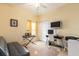 Functional guest bedroom or study with desk and neutral-colored carpet at 14741 Sapodilla Dr, Orlando, FL 32828