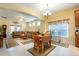 A beautiful and inviting living area with large area rugs, perfect for Gathering gatherings at 14741 Sapodilla Dr, Orlando, FL 32828