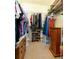 Spacious walk-in closet with ample shelving and storage options at 14741 Sapodilla Dr, Orlando, FL 32828