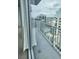 Balcony showcasing a stunning urban view with glass sliding door at 155 S Court Ave # 2008, Orlando, FL 32801