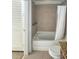 Cozy bathroom featuring a shower-tub combo and granite countertop at 155 S Court Ave # 2008, Orlando, FL 32801