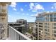 Expansive city view from a private balcony, featuring modern buildings and a vibrant skyline at 155 S Court Ave # 2008, Orlando, FL 32801