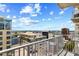 Breathtaking city view from a private balcony with a bright blue sky on a sunny day at 155 S Court Ave # 2008, Orlando, FL 32801