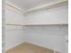 Walk-in closet featuring organized shelving and plenty of space for optimal storage at 155 S Court Ave # 2008, Orlando, FL 32801