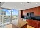 Contemporary kitchen with stainless steel appliances, granite counters, and city views at 155 S Court Ave # 2008, Orlando, FL 32801