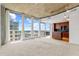 Open concept floorplan highlighting kitchen, living room, and expansive window views at 155 S Court Ave # 2008, Orlando, FL 32801