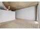 Open-concept living space featuring high ceilings and a wall of windows at 155 S Court Ave # 2008, Orlando, FL 32801
