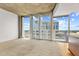 Bright and airy living room with large windows providing stunning cityscape views at 155 S Court Ave # 2008, Orlando, FL 32801