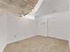 Loft featuring modern lighting fixtures, neutral carpeting, and a smooth white door at 155 S Court Ave # 2008, Orlando, FL 32801