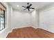 Bright bedroom with wood flooring, closet, ceiling fan, and modern decor at 1741 Palmer Ave, Winter Park, FL 32789