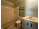 Bathroom featuring a walk-in shower, toilet, shelving unit, and single sink vanity at 2009 Nottingdale Ln, Winter Park, FL 32792