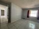 Tile bedroom with natural light from the window at 2009 Nottingdale Ln, Winter Park, FL 32792