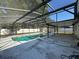 Enclosed pool with spacious screened-in patio, perfect for outdoor entertaining and relaxation at 2009 Nottingdale Ln, Winter Park, FL 32792