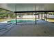 Enjoy a beautiful swimming pool surrounded by a screened-in enclosure and concrete deck at 2009 Nottingdale Ln, Winter Park, FL 32792