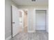 Bedroom features gray flooring, a standard closet, and an ensuite bathroom at 2028 Donegan Pl, Orlando, FL 32826