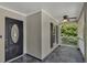 Cozy front porch featuring a ceiling fan and tiled flooring, offering a comfortable outdoor space at 2028 Donegan Pl, Orlando, FL 32826