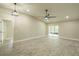 Open living area features tile floors, recessed lighting, modern fan, and sliding door access at 2028 Donegan Pl, Orlando, FL 32826